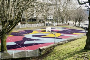 Besançon : Réalisation d’une peinture monumentale sur le terrain de sport Isenbart
